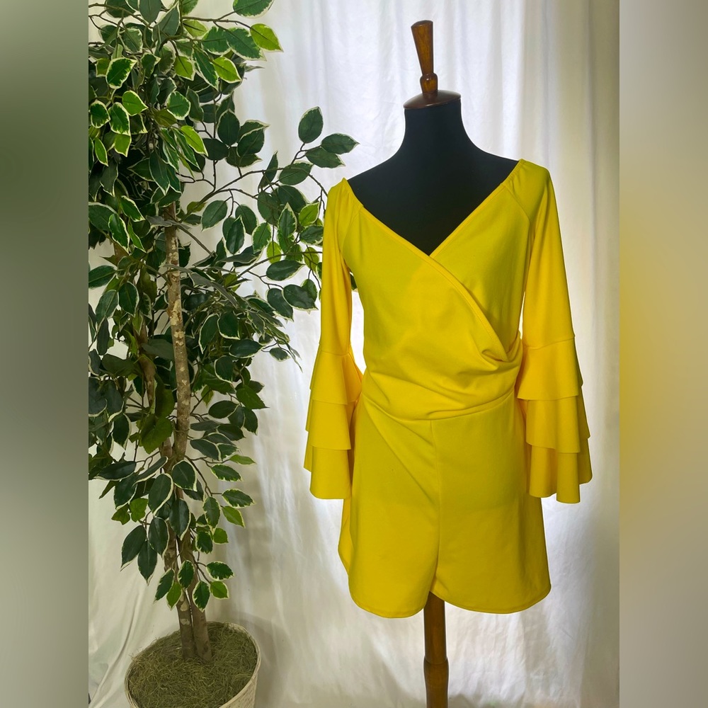 Bright yellow ruffle sleeve romper